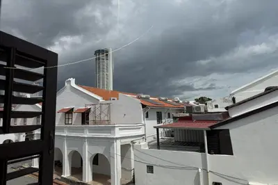 a view of a group of buildings from a balcony at Carnarvon Heritage Lodge in George Town