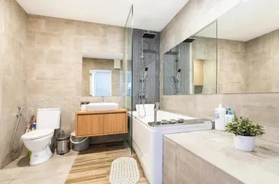 a bathroom with a toilet and a sink and a shower at Mansion One Executive Bathtub 1Bedroom 2-4pax in George Town