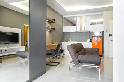 a living room with a table and chairs and a kitchen at Mansion One Executive Bathtub 1Bedroom 2-4pax in George Town