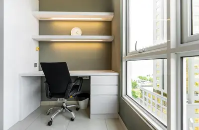 an office with a desk and a chair next to a window at Mansion One Executive Bathtub 1Bedroom 2-4pax in George Town
