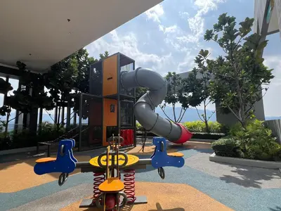 a playground in a building with a slide at Georgetown#Beacon Executive Suite SkyPool#Luxury&Glamorous Suite#2BR#Living Room with Queen Bed in George Town