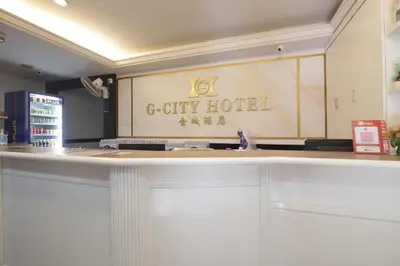 a bar with a sign for a city hotel at G CITY HOTEL in Teluk Intan