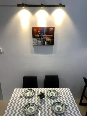 a table with plates of food on top of it at New GoldenHill Condo 3BR 1Min Pasar Mlm Cameron Highlands in Tanah Rata