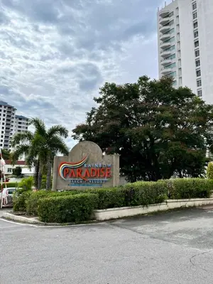 a sign for a parking garage in a city at Seaview Deluxe Rainbow Paradise Tg Bungah 8pax in Tanjung Bungah