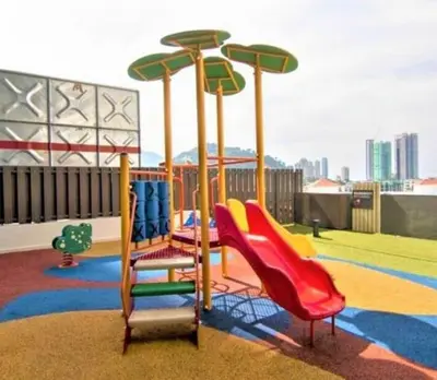 a childrens playground with a slide at Jazz Service Suites 2 Bedroom 23-3 by Yen's Sojourn in Bagan Jermal