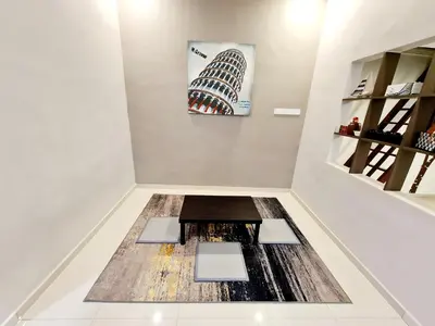 a room with a floor with a picture on the wall at Air-home No135 Kampung Boyan, 3BR, 6pax Netflix in Taiping