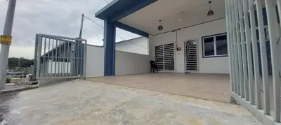a large white building with a large patio at Homestay D'Mama Īfor mūslimĪ in Tanjung Malim