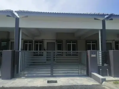 a building with a gate in front of it at Homestay Dorani Sungai Besar in Sungai Besar