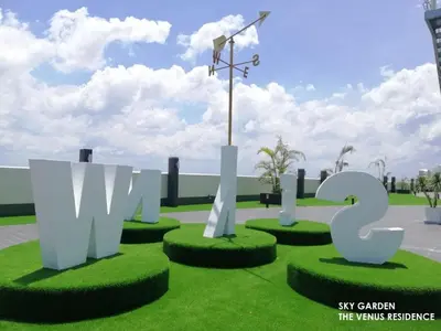 a sign for a city garden with a weather vane at Venus Hollywood Homestay Sitiawan in Seri Manjung