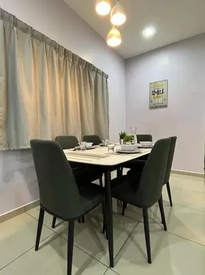 a conference room with a table and chairs at Titihouse Semi-D for 14 pax near Iconvcity Auto city Bukit Mertajam Juru in Bukit Mertajam