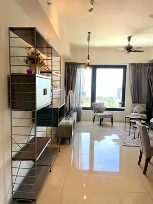 a living room with a book shelf and a living room at The Ash, 3BR Seaview by WStay @ Tropicana 218 Macalister in George Town