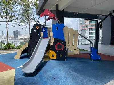a playground in a building with a slide at The Ash, 3BR Seaview by WStay @ Tropicana 218 Macalister in George Town