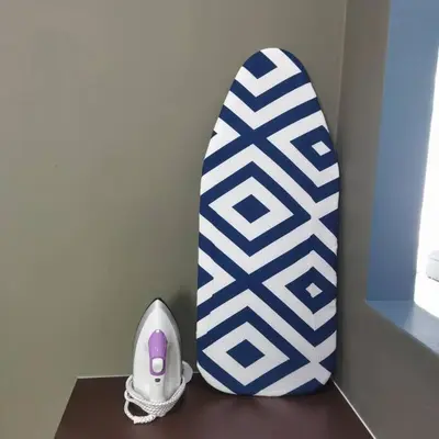 a blue and white surfboard sitting on top of a table at 191 Cozy Casa Kayangan 3BR 6pax by Grab A Stay in Ipoh