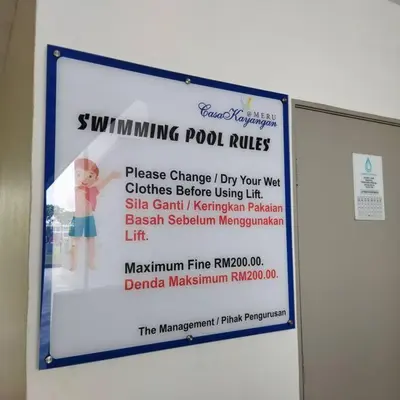 a sign for the swimming pool rules on a wall at 191 Cozy Casa Kayangan 3BR 6pax by Grab A Stay in Ipoh