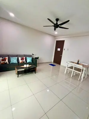 a living room with a couch and a ceiling fan at 191 Cozy Casa Kayangan 3BR 6pax by Grab A Stay in Ipoh