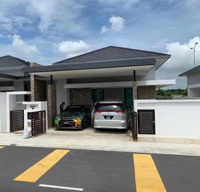 a house with two cars parked in front of it at MMG D'Bertam Homestay For Malay Only in Kampong Permatang Durian