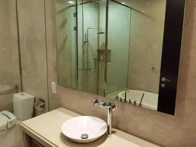 a bathroom with a sink and a shower and a toilet at WHITE HOUSE STRAITS QUAY MARINA LUXURY STAY GURNEY in Tanjong Tokong