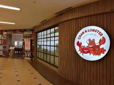 a sign on the wall of a store at WHITE HOUSE STRAITS QUAY MARINA LUXURY STAY GURNEY in Tanjong Tokong