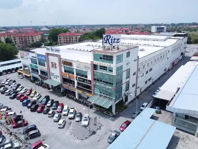 an aerial view of a parking lot in front of a building at Ritz Garden Hotel Manjung in Lumut