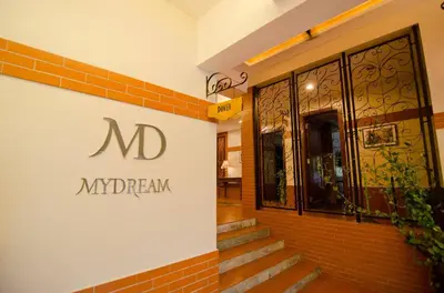 a building with a sign that reads macy break at MyDream Guest House in Ipoh