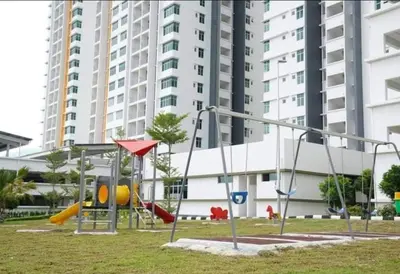 a playground in a park in front of a building at D' Homestay Meru Ipoh - Free WiFi in Ipoh