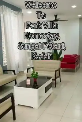 a living room with a sign that reads welcome to parks villa homesagencyagency at Park Villa Homestay in Sungai Petani