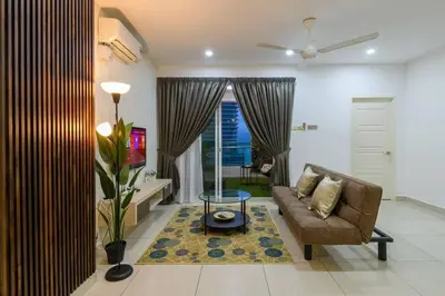 a living room with a couch and a table at 2R1B/Seaview Tropical /1~8Pax/Gurney Mansion One in George Town