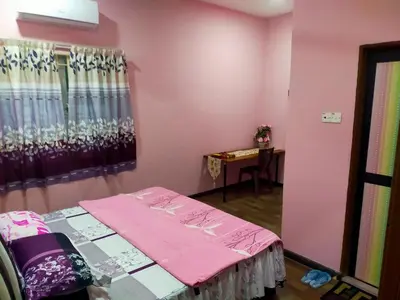 a small room with a table and a window at Villa Auliyya - MusleemHomestay in Kampong Sungai Leman