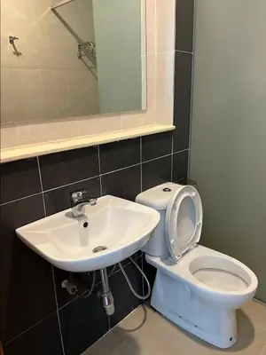 a bathroom with a sink and a toilet at NEW 6pax 3BR Sunrise view 100m Attractive Places Kea Farm in Cameron Highlands