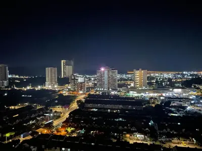 a view of a city at night with lights at NEW 6Pax SOHO Near USM & SPICE ARENA & AIRPORT in Bayan Lepas