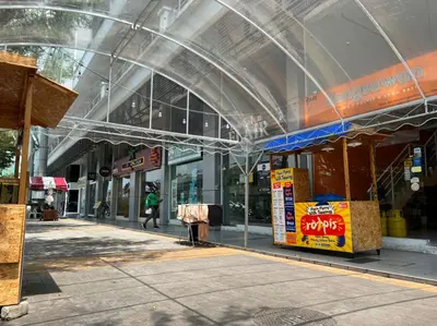 a building with a glass domed ceiling and a street at NEW 6Pax SOHO Near USM & SPICE ARENA & AIRPORT in Bayan Lepas