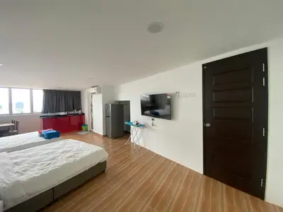 a bedroom with a bed and a tv on a wall at 6PAX 1 BEDROOM SOHO Near USM SPICE ARENA PANTAI SPECIALIST AIRPORT in Bayan Lepas