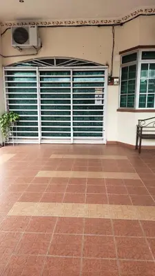 a room with a gate and a bench on a tile floor at Zulkifli Homestay Tambun,Ulu kinta,Tg Rambutan in Ipoh