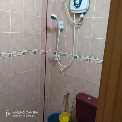 a shower in a bathroom with a toilet at Zulkifli Homestay Tambun,Ulu kinta,Tg Rambutan in Ipoh