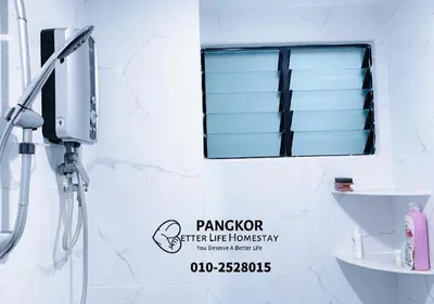 a bathroom with a shower and a window at Pangkor Pasir Bogak Apartment 2Rooms 2Bathrooms near beach 6pax FREE WIFI in Pangkor
