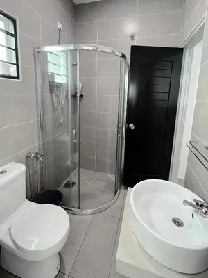 a bathroom with a shower and a toilet and a sink at LOW SEASON PROMOTION! 4B12B Mountainville Bungalow in Ipoh