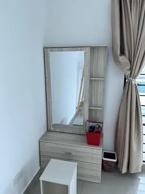 a mirror sitting on a dresser next to a table at LOW SEASON PROMOTION! 4B12B Mountainville Bungalow in Ipoh