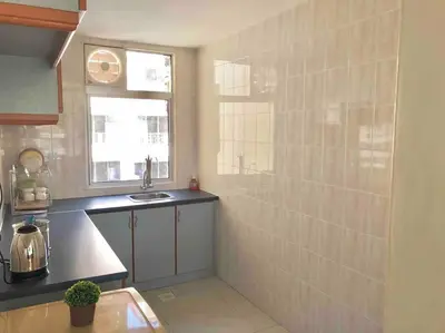 a small kitchen with a sink and a window at Natural Paradise 3Mins to Beach at Teluk Batik Lumut in Lumut