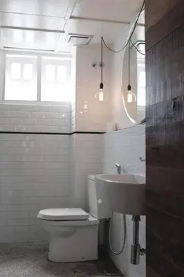 a bathroom with a toilet and a sink at 80 Colonie Fraser's Hill 4pax in Bukit Fraser