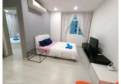 a bedroom with a bed and a desk and a television at City Town 2-6 Pax Beautiful View Cozy Condo, Jelutong, Georgetown, Centre Heart Of Penang Island, near Highway Komtar Gurney in George Town