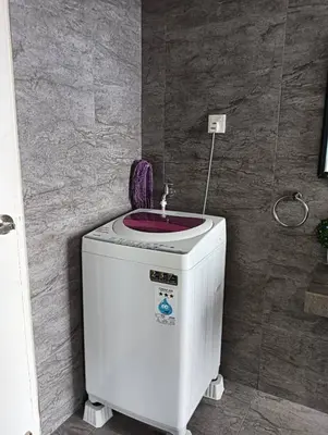 a bathroom with a sink on top of a water heater at Lovers under Cupid's Arrow 丘比特之箭下の恋人 in Butterworth