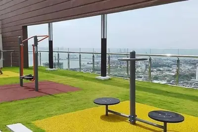 a gym with two stools on the roof of a building at Lovers under Cupid's Arrow 丘比特之箭下の恋人 in Butterworth