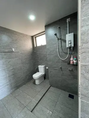 a bathroom with a shower and a toilet at Blue Aesthetic Luxury Seaview 3 min Drive Sunway in Butterworth