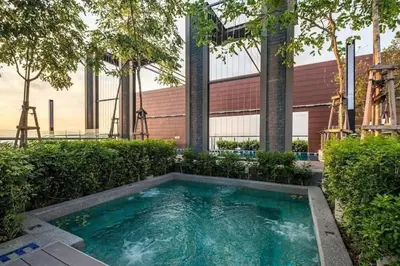 a swimming pool in front of a building at Blue Aesthetic Luxury Seaview 3 min Drive Sunway in Butterworth