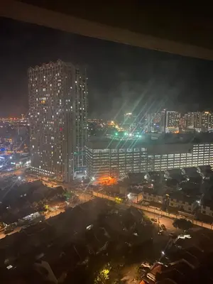 a view of a city at night with lights at 6 PAX 1 BEDROOM SOHO near SPICE ARENA PANTAI SPECIALIST AIRPORT in Bayan Lepas