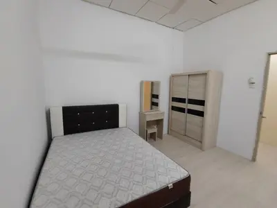 a white bedroom with a bed and a dresser at GP Hostel Penang in George Town