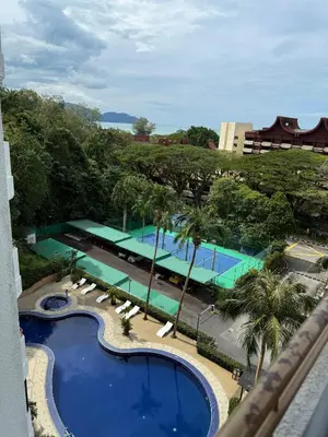 an overhead view of a pool at a resort at Batu Feringgi Sri Sayang Apartment in Batu Ferringhi