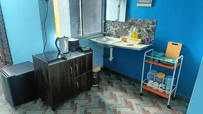 a small bathroom with a sink and a counter at SR Kampar Homestay, Bandar Baru Kampar in Kampar