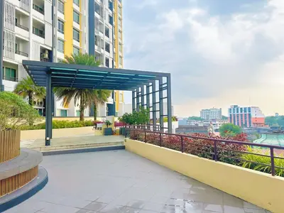 awning over a walkway in a city with buildings at The Majestic Ipoh Town by 178homestay in Ipoh