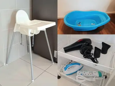 a white desk and a blue chair and some items at Sunway Onsen Studio @ Lost World of Tambun in Ipoh
